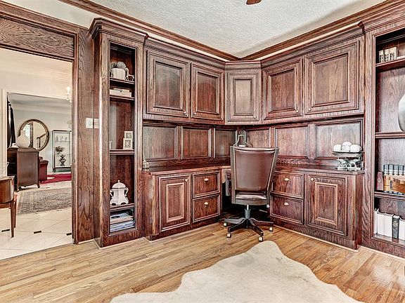 Another view of the study, note the general storage on two walls leaving flexibility in furniture and desk placement.