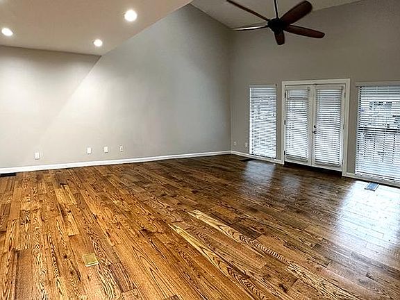 Huge Living Room - open floor plan with gorgeous wood floors