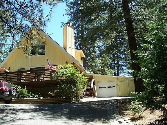 View from Driveway showing attached Garage