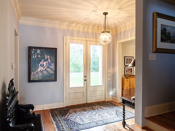Foyer with stair cause right