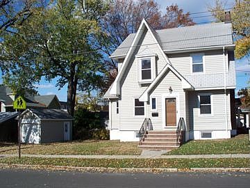 Front view of home,garage on left.