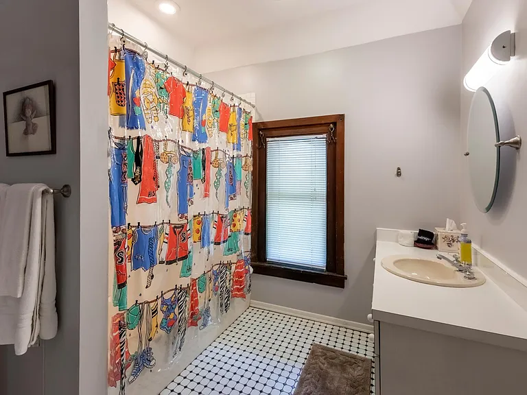Private bath, off Bedroom with 2 single beds,