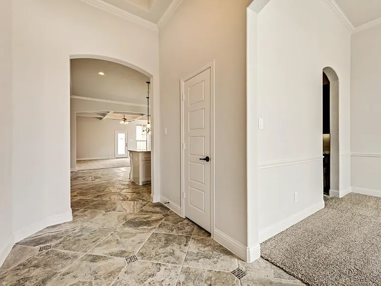 Foyer flows into Great room and Dining room