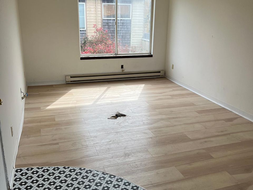 Another picture showing flooring transition. All new flooring throughout.
