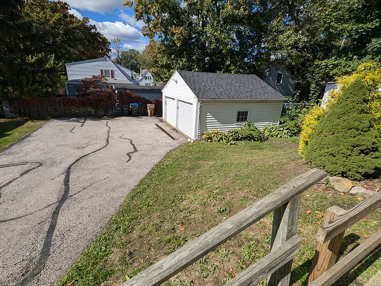 Garage parking. Upstairs tenant uses the far space.