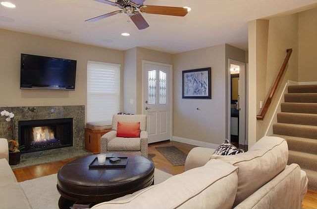 Living room. TV mount included, not TV. Fireplace in good w