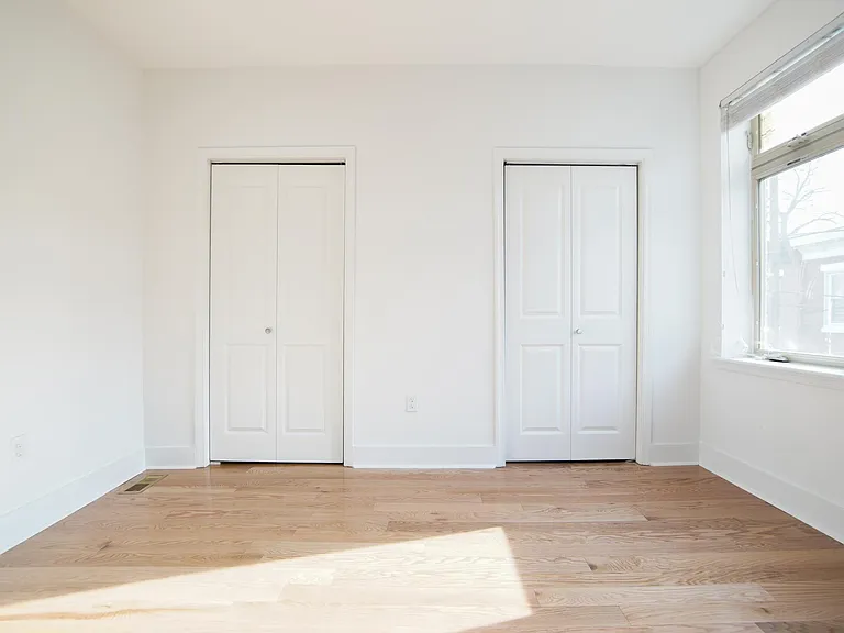 Second Bedroom with his & her closets