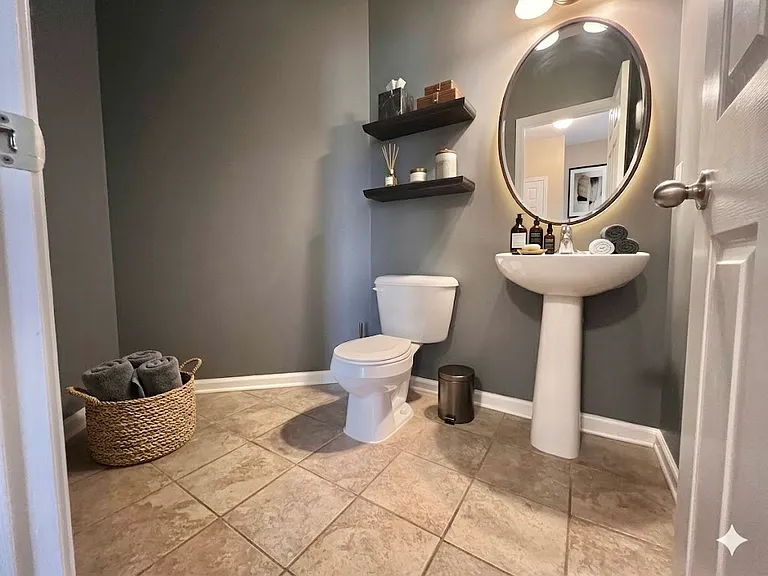 Downstairs Half-bath (Virtually staged)