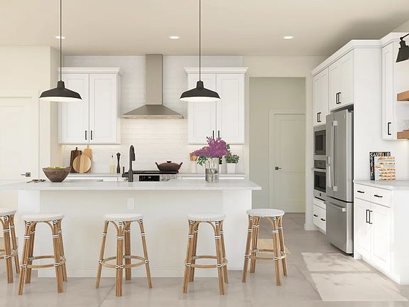 Kitchen with pendant lighting and floating shelves