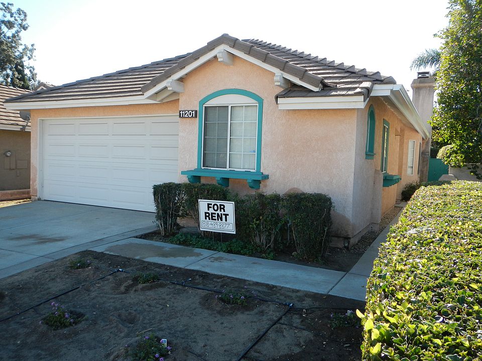 Front with new water-saving drip irrigation.