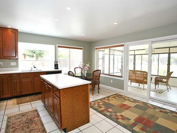 Kitchen facing the sunroom