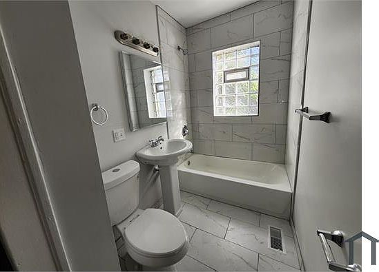 4th image of 7557 S Eberhart Ave #1