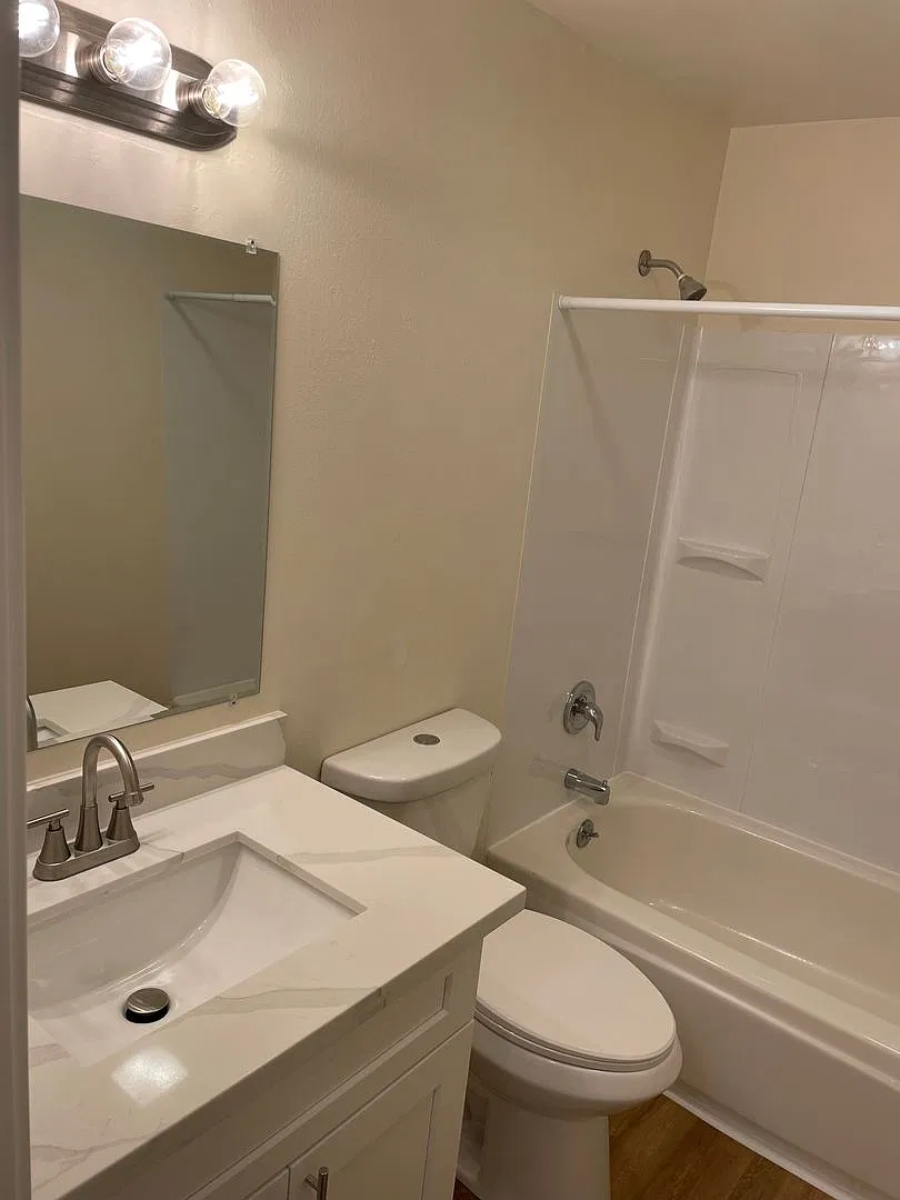 Village Apartments — Photo 4