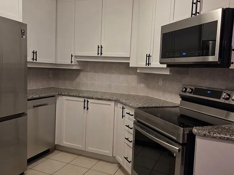 80 Harrison Garden Blvd #116 — Photo 6