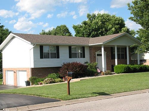 manicured yard & beautiful landscaping