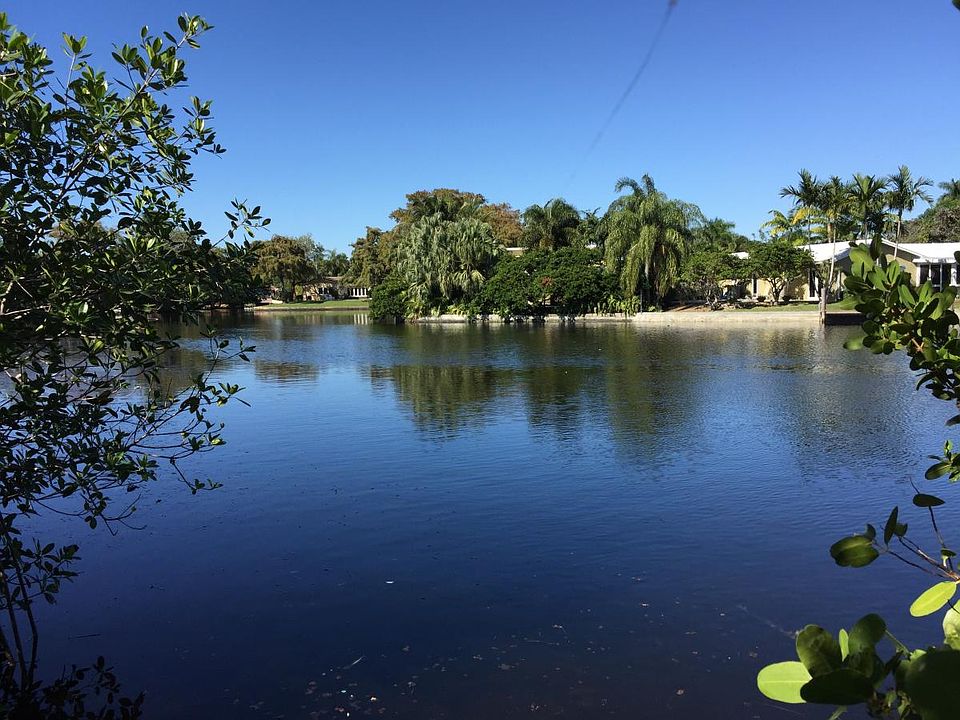 Apartment 3 is directly on scenic Middle River & has its own Riverfront Patio & White Sand Beach.