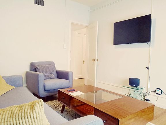 Living Room with smart TV Mid-Century modern furnishings