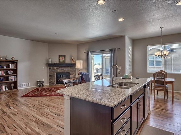 Large island area and wired for pendant lighting.