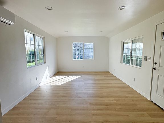 The front door opens to the living room & dining room.,