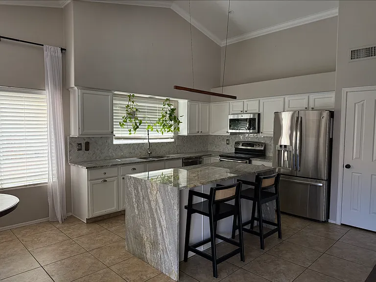 Breakfast nook with backyard views and natural light.