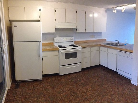 Kitchen opens to living room