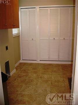Laundry Room with Pantry/Storage, easy access from Carport!
