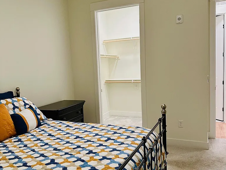 Bedroom with walk in closet