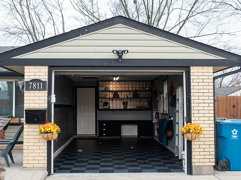 A warm welcome! Our well-maintained garage adds a modern touch and great curb appeal to the home.