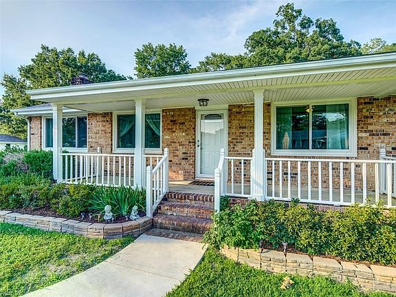 Wide front porch -new door and fresh paint