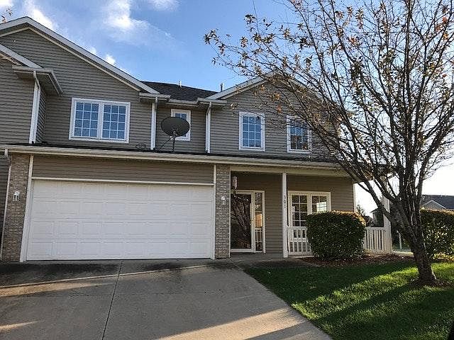 Beautiful End Unit With Two Stall Garage With Electric Door Opener. Unit has Electronic Front Lock for easy of entry.