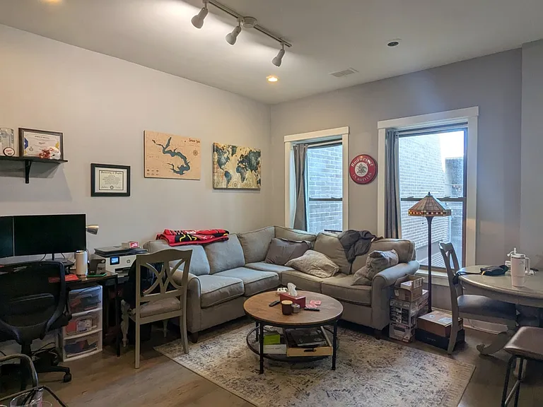 Living Area with previous tenant furniture set up