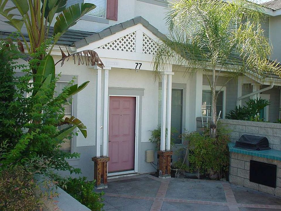 Front door and yard with BBQ