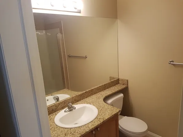 8 Prestwick Pond Ter SE #102, Calgary, AB T2Z 4P3