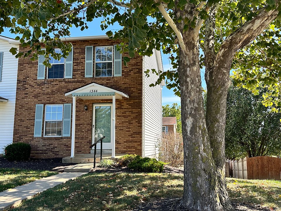 Brick front end unit with large shade tree