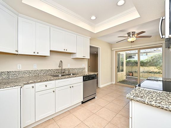 Stainless-steel sink with garbage disposal. Dishwasher.