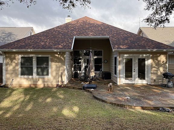 Rear of house w/ large patio