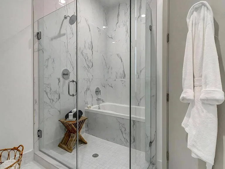 Luxury Bathrooms with Oversized Soaking Tubs & Frameless Glass Shower Enclosure