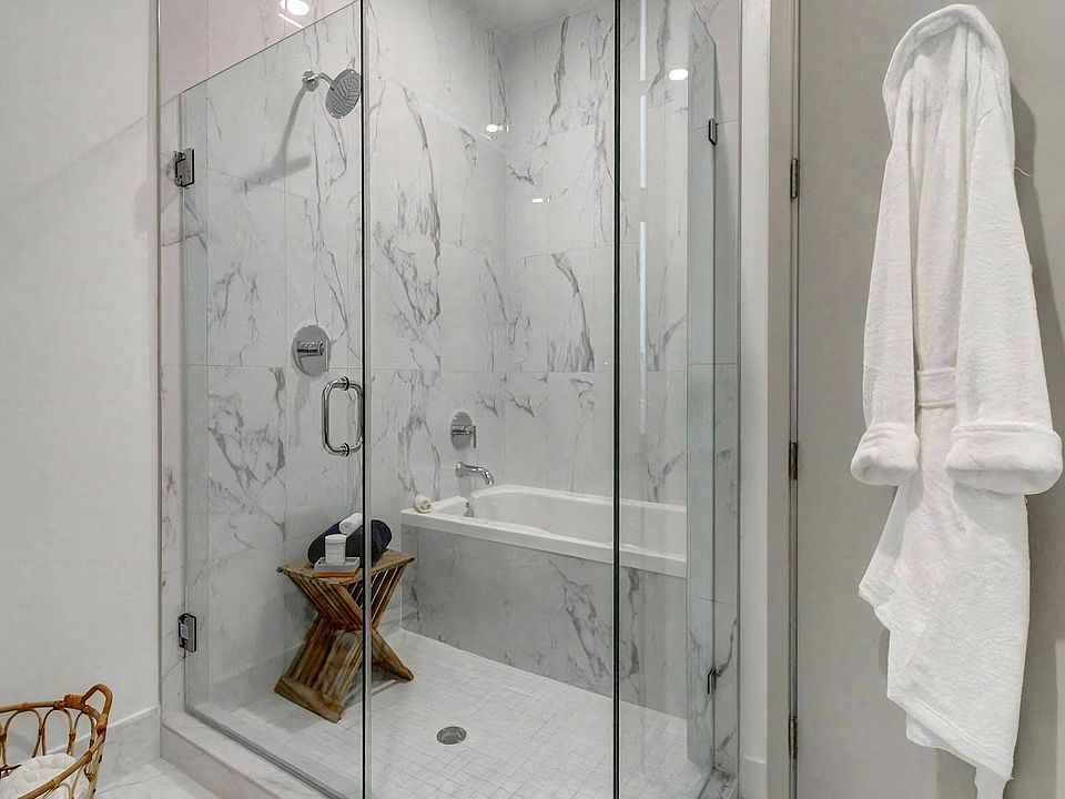 Luxury Bathrooms with Oversized Soaking Tubs & Frameless Glass Shower Enclosure