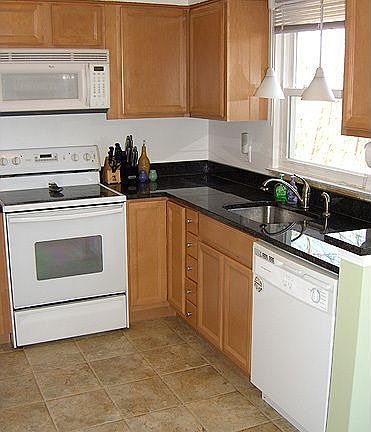 All new kitchen cabinets, flooring and granite countertops! 