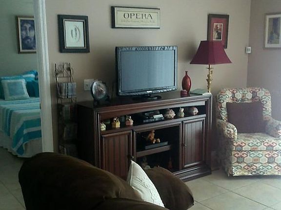 Living Room with access to the patio