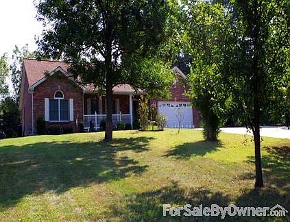 Front of House
						:
						All brick with country porch makes for a grand entrance.