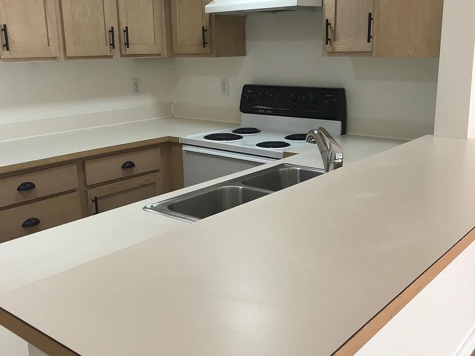 Kitchen open into living and dining area.