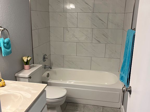 new tile and fixtures in bathroom!