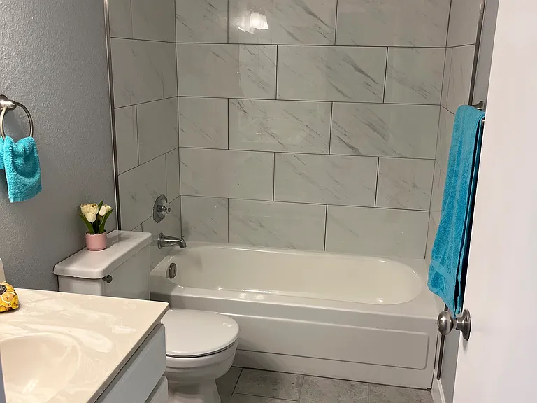new tile and fixtures in bathroom!