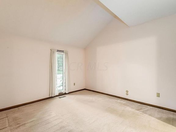 Spacious Den with Cathedral Ceilings