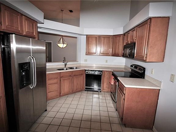 Kitchen Offers Solid Surface Counters & All Appliances