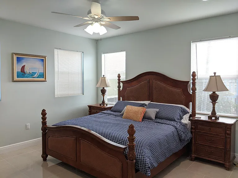 Master Bedroom with King-sized mattress & memory foam pillows.