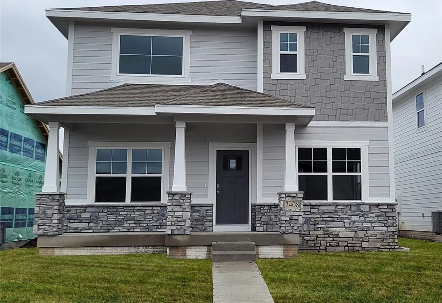 Modern 4-Bedroom Home in Prairie Trail | 2408 SW Plaza Parkway — Photo 1