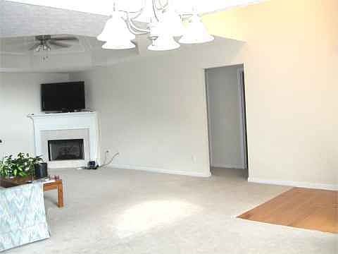 View of the family room from the separate formal dining room