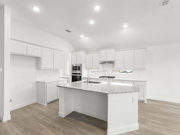 Carrollton floor plan by Pacesetter Homes showcasing a thoughtfully designed one-story layout with o